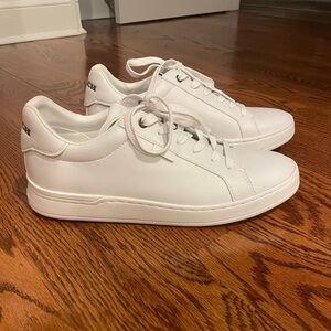 Coach sneakers . Women’s size 8. Hardly worn. Like new.